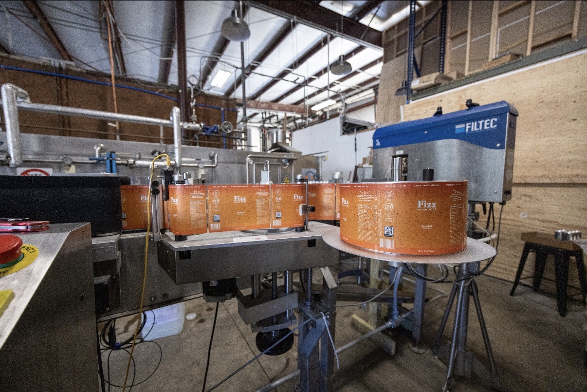 Labeling line with the FILTEC inspection unit in the production facility